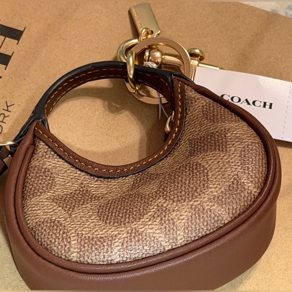Coach Mini Carmen Bag Charm in Signature
Canvas NWT - Picture 5 of 5